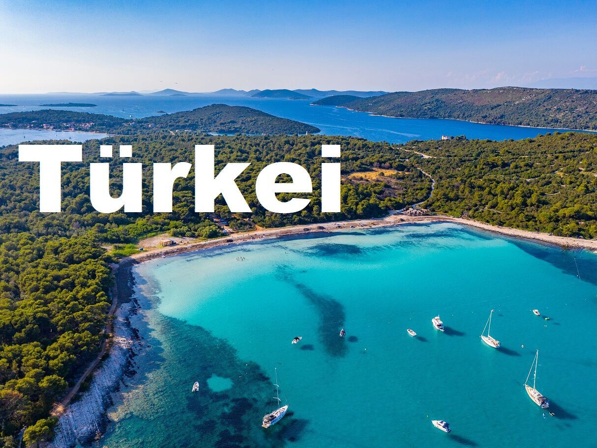 Aerial view of sailing boats in a beautiful azure turquoise lagoon on Sakarun beach bay on Dugi Otok island, Croatia, beautiful seascape